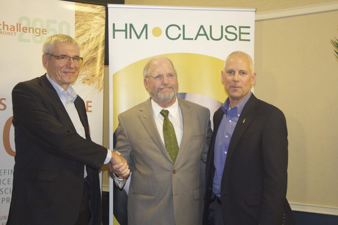 Upon announcing a strategic partnership, Limagrain CEO Daniel Cheron (left) shakes hands with Jack Payne (middle), University of Florida senior vice president of agriculture and natural resources. Also pictured is Matthew Johnston (left), CEO for HM.CLAUSE.