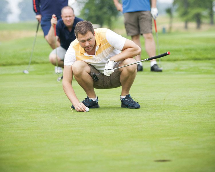 Focus is the name of the game at the annual CSTA golf tournament.