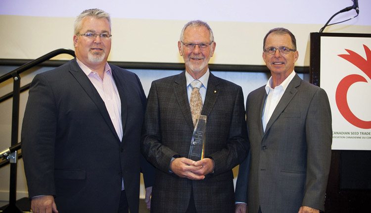 The Canadian Plant Breeding and Genetics Award was presented to Francis Glenn (pictured center).