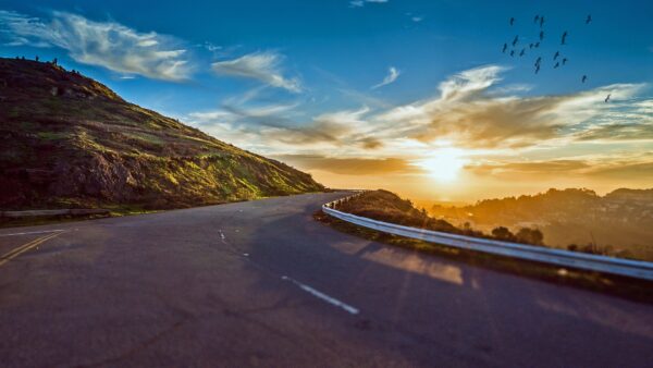 picture of bright sky and winding road
