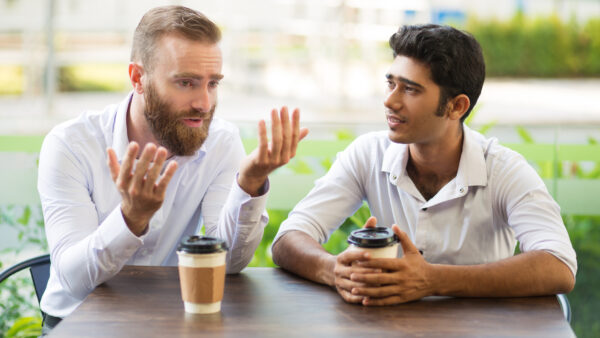 Two men having a casual conversation