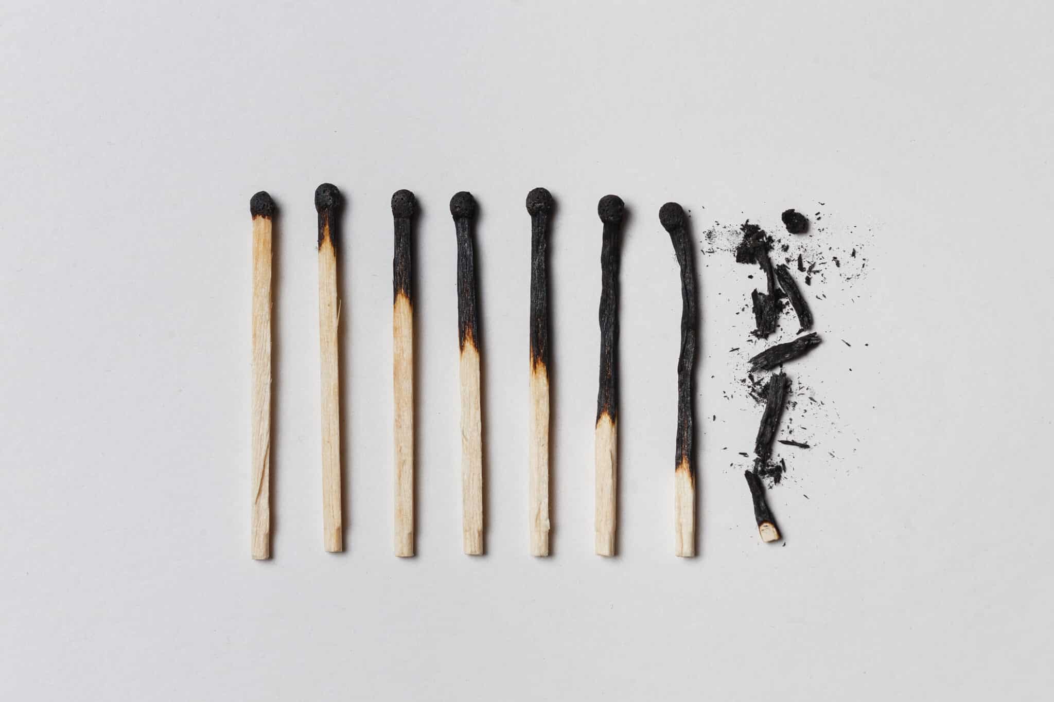 Charred matches, each one burn a little more than the last.