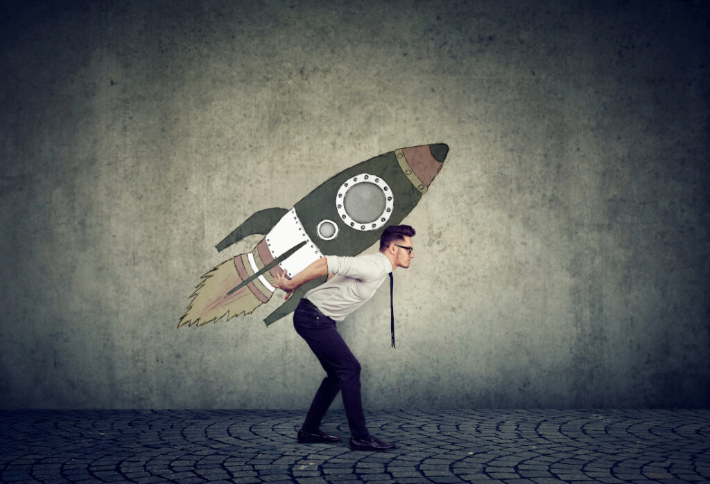 Side view of businessman inspired with fast growth with rocket on background