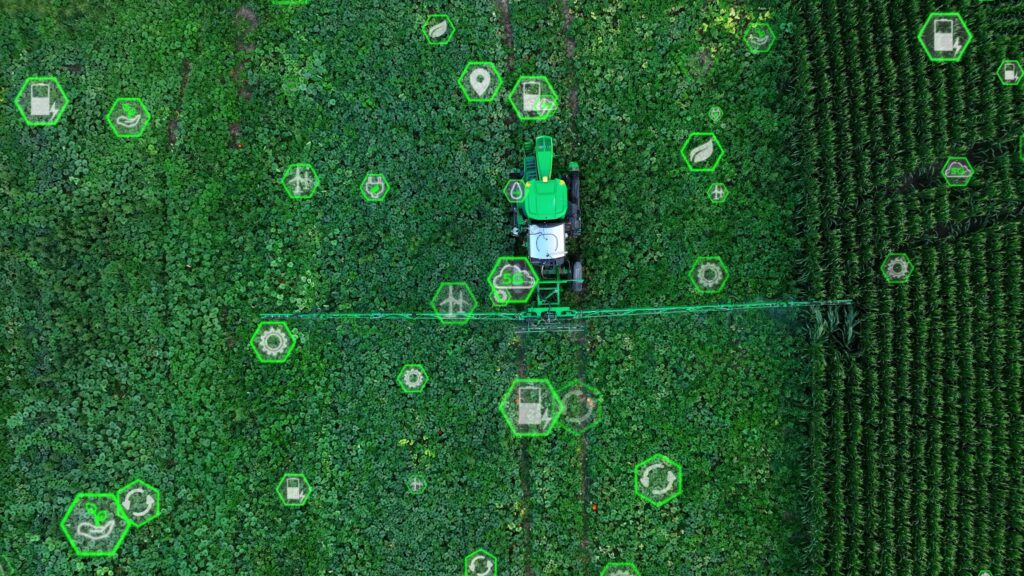 Autonomous self driving tractor with green, sustainable icons. Top down aerial Graphic 3D overlay concept. The future of technology farming