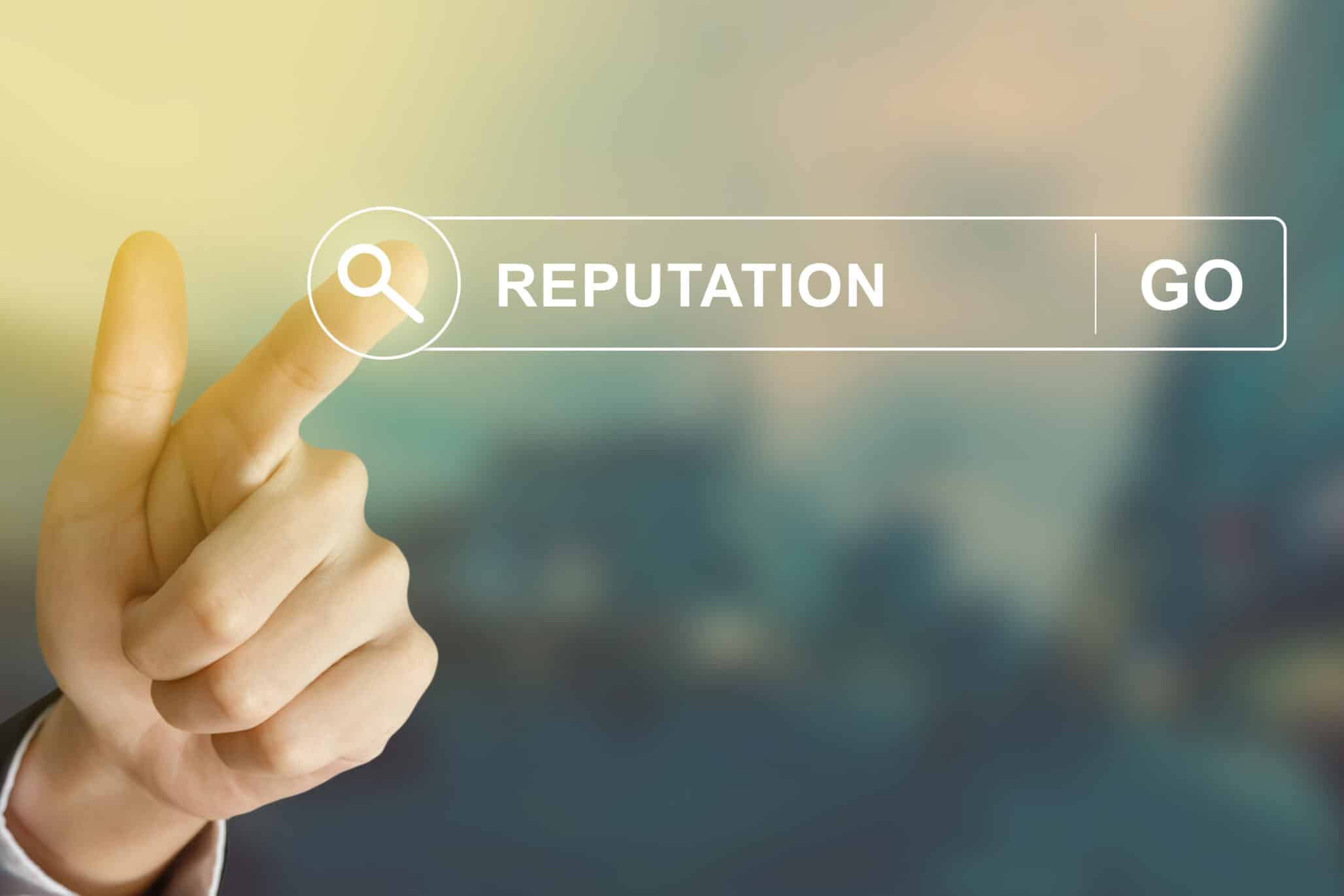 business hand clicking reputation button on search toolbar with vintage style effect