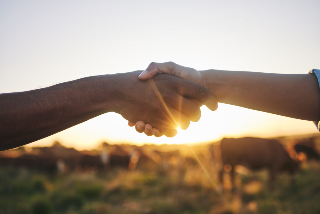 Welcome, handshake and people with b2b farm deal for agriculture, partnership or small business support. Thank you, shaking hands and farming collaboration for supply chain