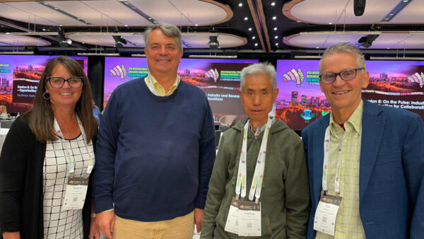 D.J. Bing (second from right) at a conference in Australia with colleagues Robyne Davidson, Stan Blade and Tom Warkentin. Photo courtesy Robyne Davidson