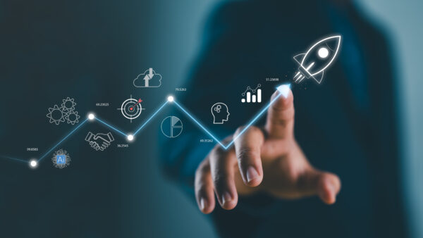Businessman touch rocket launch investment growth, planning and starting corporate business start up aiming objective value development leadership and customer target group
