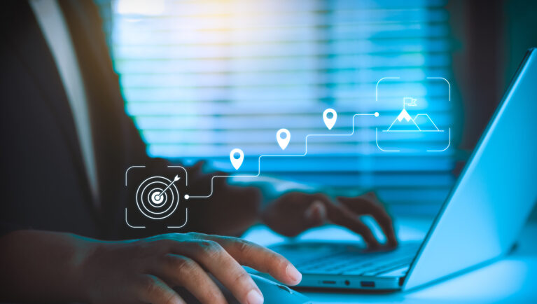Business Goal Setting, Strategic Planning Concept, Professional Using Laptop and Mouse, Digital Roadmap Icons Showing Target, Milestones, Growth Path, and Achievement for Corporate Strategy Success