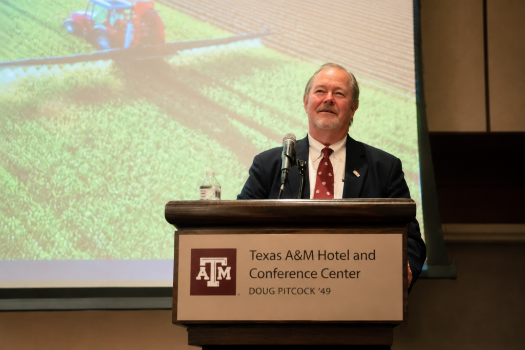USDA Under Secretary Scott Hutchins addresses attendees at the National Association of Plant Breeders meeting at Texas A&M University.