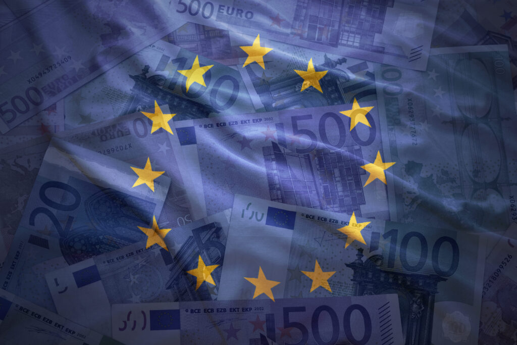 colorful waving european union flag on a euro money background