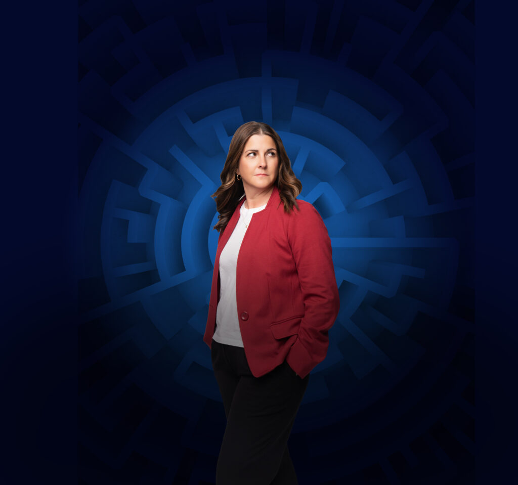 Karen Withers, founder of AgCultured Consulting, with a maze representing complex seed labeling regulations.