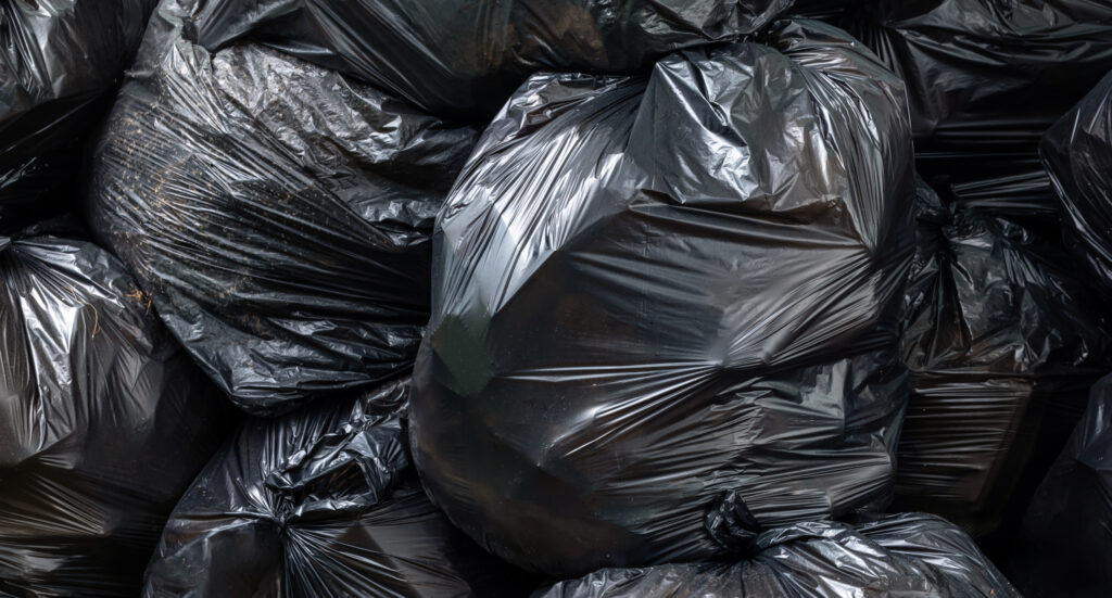 waste, pile of black garbage bags, plastic waste problem and environmental pollution, plastic waste, suitable for recycling and waste management concept